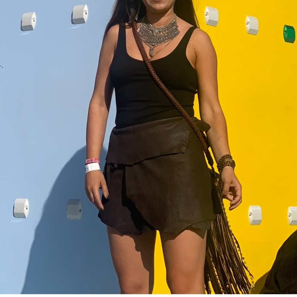 Vintage handmade leather wrap on mini skirt